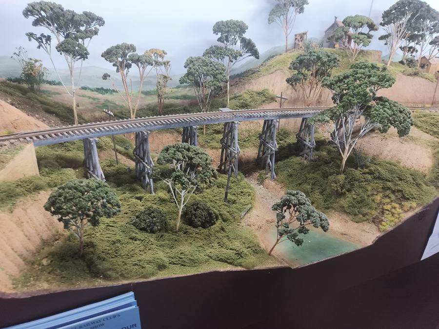 Trestle bridge with gum trees